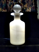 [picture: Antique white glass bottle 2]