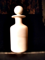 [picture: Antique white glass bottle 3]