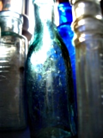 [picture: Old bottles in daylight]