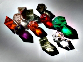 [picture: coloured plastic gaming dice]