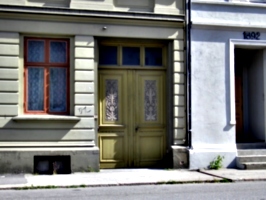 [picture: Carved wooden doorway]