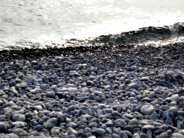 [picture: Waves lapping the beach]