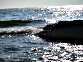 [picture: Waves on rock]