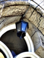 [picture: Lantern in arched doorway]