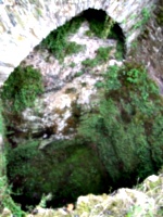 [picture: Restormel Castle 29: Looking down the well 2]