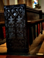 [picture: Parish Church 14: Carved end of a pew 2]