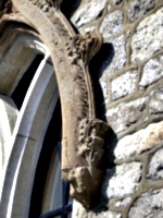 [picture: Floral stone-carving on an arch]