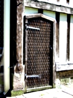 [picture: Ancient studded oak door]