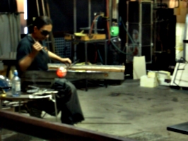 [picture: Shaping the new glass vase]