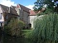 [Picture: Old abbey buildings and willow tree]