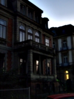 [picture: Creepy old building with stone balcony]