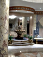 [picture: Hotel lobby: marble fountain]