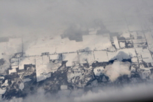 [picture: Snow-covered fields seen through clouds 5]