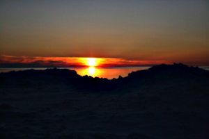 [picture: Sunset on snow-covered beach]