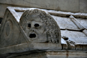 [picture: Theatrical mask from late Roman stone coffin 2]